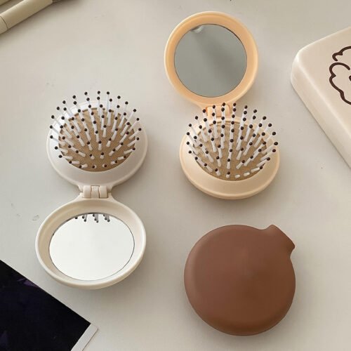 1pc Mini Portable Folding Hair Brush with Integrated Mirror, Scalp Massage Comb with Air Cushion Base for All Hair Types - Travel-Friendly Hair Care Accessory