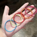 100pcs Vibrant Plain Color Hair Ties - Soft, Elastic, and Gentle Hair Bands for Ponytails, Daily Hair Accessories for Girls and Women of All Ages