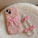 Pink Pearl Bow Phone Case with Soft Shell And Matching Bow Bracelet for Apple Iphone 11 11Promax 12 12Promax 13 13Pro 13Promax 14 14Pro 14Plus 14Promax 15 15Pro 15Plus 15Promax 16 16Pro 16Plus 16Promax