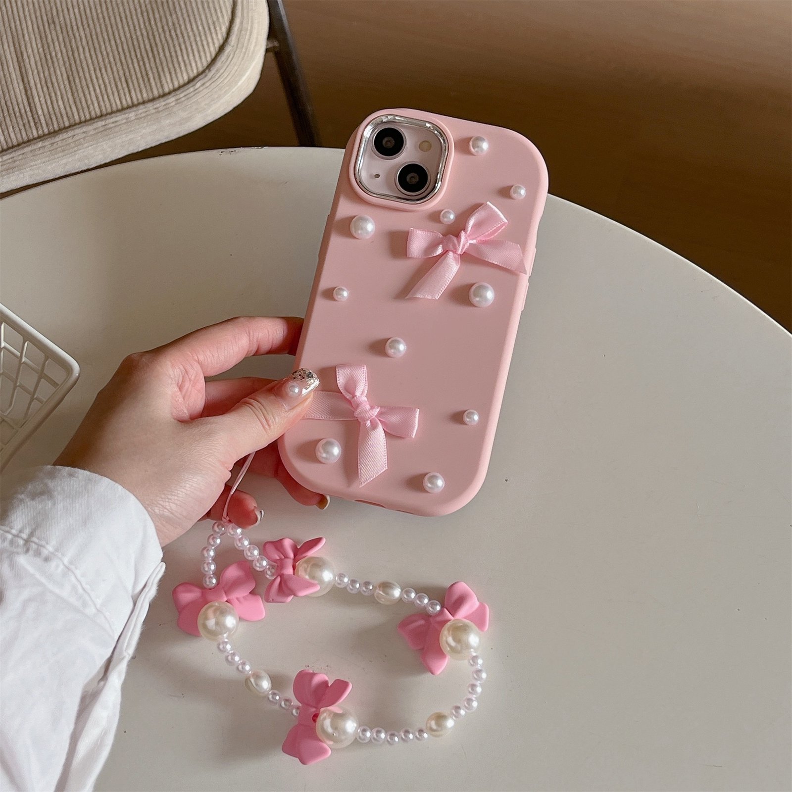 Fashion Three-Dimensional Two Bow Pearl Mobile Phone Case with Bow Bracelet Suitable for Iphone14 Mobile Phone Case Iphone13Promax New Iphone15Pro Anti-Fall Iphone12 Female Niche Iphone11 Mobile Phone Case