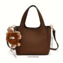 Chic Black Shoulder Bag with Golden-Tone Hardware & Decorative Pendant - Trendy Bucket Style, Versatile for All Occasions, Hand Wash Only, Ladies Handbags