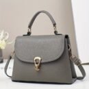 Minimalist Apricot Or Earthy Yellow Handbag with Adjustable Strap, Zipper Closure, Polyester Lining, No Pattern, No Printing, Edge Painted