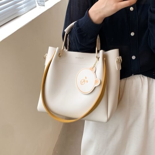 Stylish Large Capacity Women's Tote Bag - Versatile Shoulder & Crossbody Purse with Zipper Closure, PU Material, Cream Color, Golden-Toned Hardware, and Adorable Bear Charm, Crossbody Bag