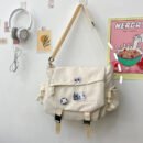 Harajuku style large capacity shoulder bag, retro workman's mail carrier bag, nylon crossbody bag for students with 4 badges included, fashionable bag suitable for men and women, perfect for back-to-school season