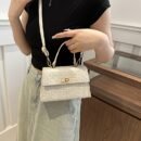 Elegant White Crossbody Bag with Golden-Tone Hardware & Floral Embossed Design - Versatile Women'S Shoulder Bag for Walking, Shopping, Travel, and Parties - Lock Closure, Detachable Strap, Everyday Carry Bag | Elegant Women'S Bag | Glossy Finis