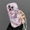 This trendy and robust shock-absorbing phone case features distinctive design, cute prints, and a hanging chain for added protection; it is compatible with Apple series 11/ 12/ 13/ 14/ 15/ 16 Pro Max, Samsung series A05/ A15/ A25/ A35/ A55/ S23/ S24 Ultra/ S25 U