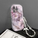This trendy and robust shock-absorbing phone case features distinctive design, cute prints, and a hanging chain for added protection; it is compatible with Apple series 11/ 12/ 13/ 14/ 15/ 16 Pro Max, Samsung series A05/ A15/ A25/ A35/ A55/ S23/ S24 Ultra/ S25 U