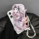 This trendy and robust shock-absorbing phone case features distinctive design, cute prints, and a hanging chain for added protection; it is compatible with Apple series 11/ 12/ 13/ 14/ 15/ 16 Pro Max, Samsung series A05/ A15/ A25/ A35/ A55/ S23/ S24 Ultra/ S25 U